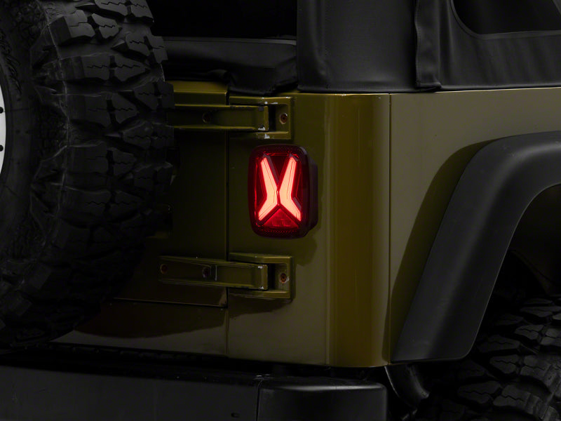 RAXIOM 76-06 Jeep CJ7 Wrangler YJ & TJ Gladiator LED Tail Lights- Blk Housing (Smoked Lens)