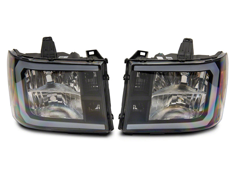 RAXIOM 07-13 GMC Sierra 1500 Axial Series Headlights w/ LED Bar- Blk Housing (Clear Lens)