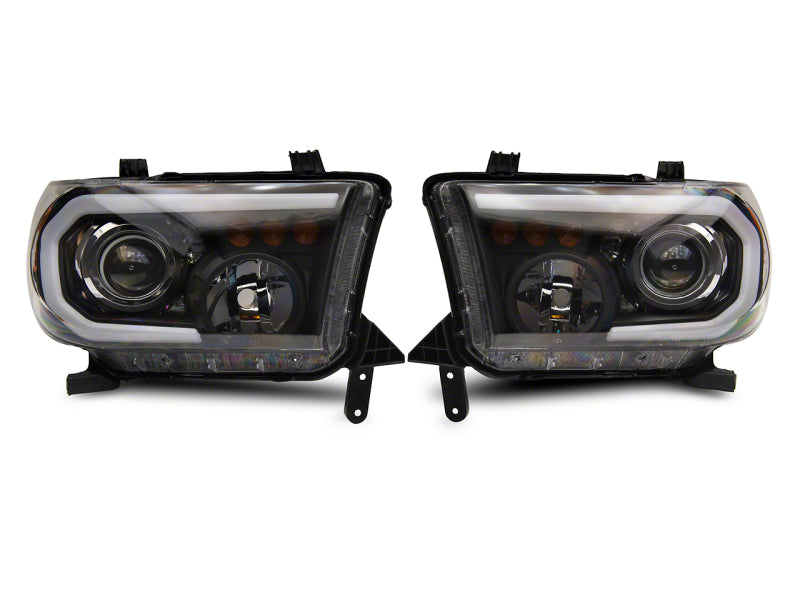 RAXIOM 07-13 Toyota Tundra Axial Projector Headlights w/ SEQL LED Bar- Blk Housing (Clear Lens)