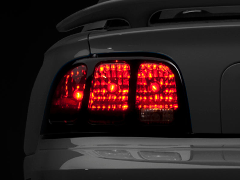 RAXIOM 96-98 Ford Mustang Tail Lights- Black Housing (Smoked Lens)