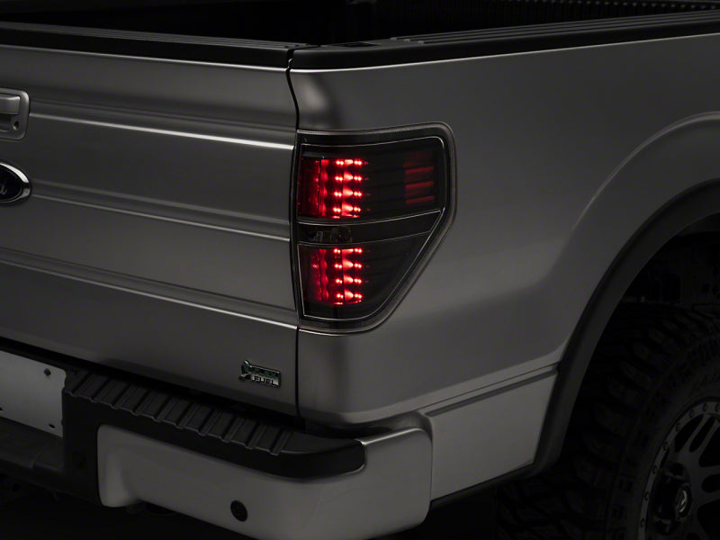 RAXIOM 09-14 Ford F-150 Styleside LED Tail Lights- Blk Housing (Clear Lens)