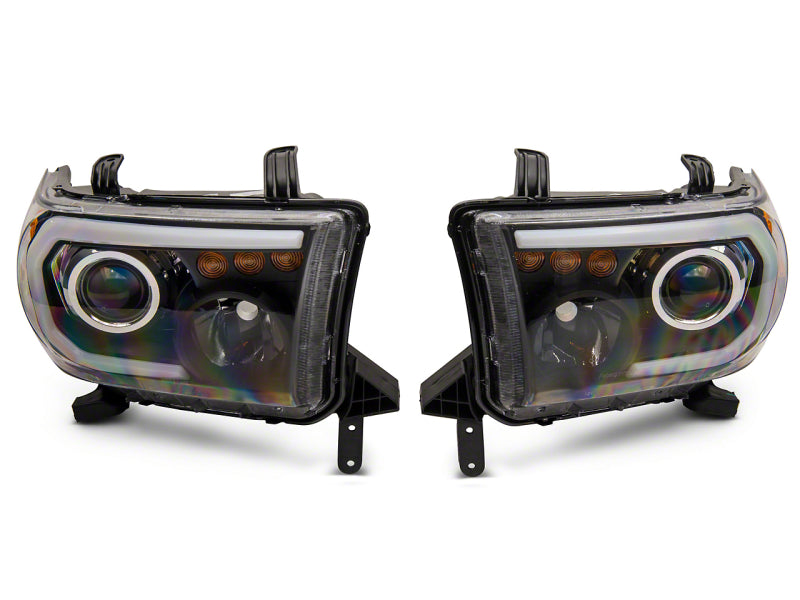 RAXIOM 07-13 Toyota Tundra Axial Series Projector Headlights w/ LED Bar- Blk Housing (Clear Lens)