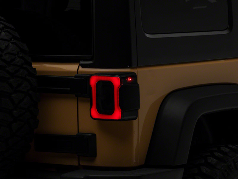 RAXIOM 07-18 Jeep Wrangler JK Axial Series LED Tail Lights- Blk Housing (Smoked Lens)