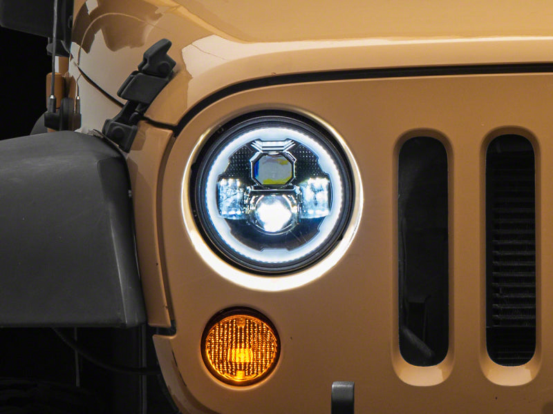 RAXIOM 07-18 Jeep Wrangler JK Axial 7-In LED Headlights w/ DRL Turn Signals- Blk Housing (Clear)