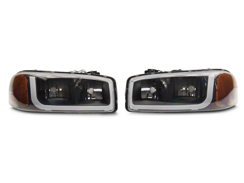 RAXIOM 99-06 GMC Sierra 1500 Axial Series Headlights w/ LED Bar- Blk Housing (Clear Lens)