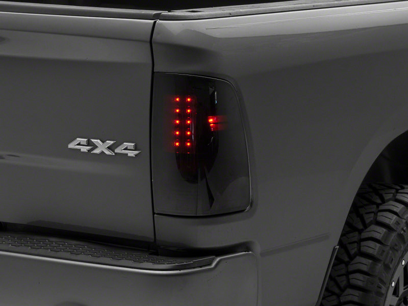 RAXIOM 09-18 Dodge RAM 1500/2500/3500 Axial Series LED Tail Lights- BlkHousing- SmokedLens