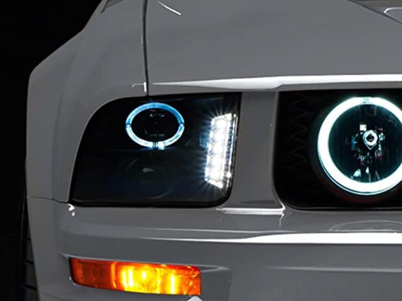 RAXIOM 05-09 Ford Mustang w/ Halogen LED Halo Prjctr Headlights-Blk Hsng(Smoked Lens Exclude GT500)