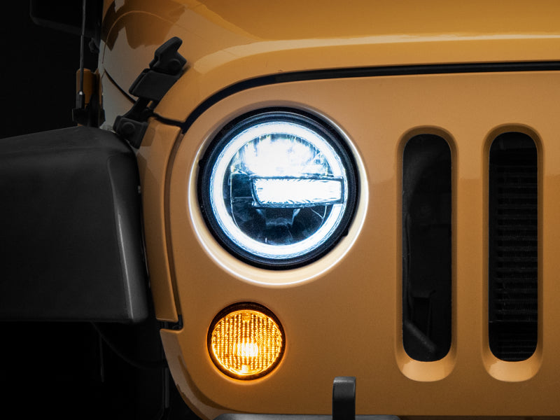 RAXIOM 97-18 Jeep Wrangler TJ/JK 7-Inch LED Headlights w/ Halos- Black Housing (Clear Lens)